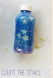 Image shows a plastic water bottle repurposed as a craft activity involving cut out stars.